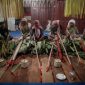 Ratusan bayi dan balita diayun dalam balutan dekorasi meriah saat tradisi Baayun Mulud di Kalimantan Selatan, sebuah ritual penuh doa dan harapan bagi generasi penerus.